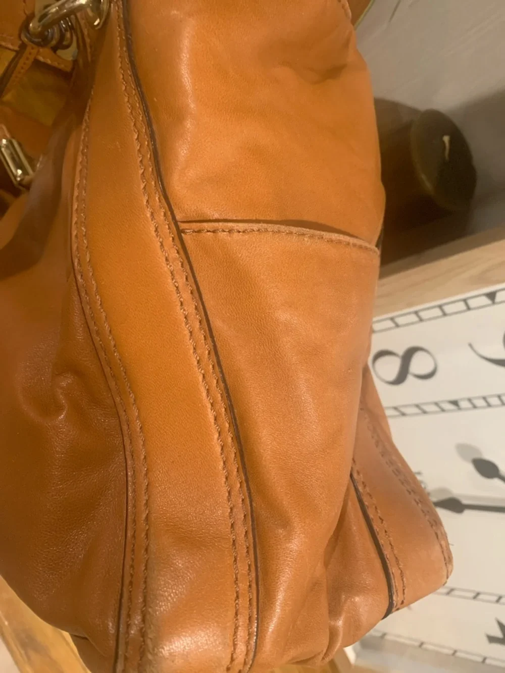 Michael Kors Ludlow Cognac Leather Drawstring Shoulder Bag with Gold Accents - Picture 9 of 16